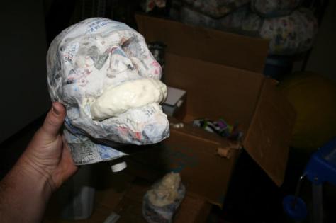 After completing the papier mache I filled the head with expanding foam.